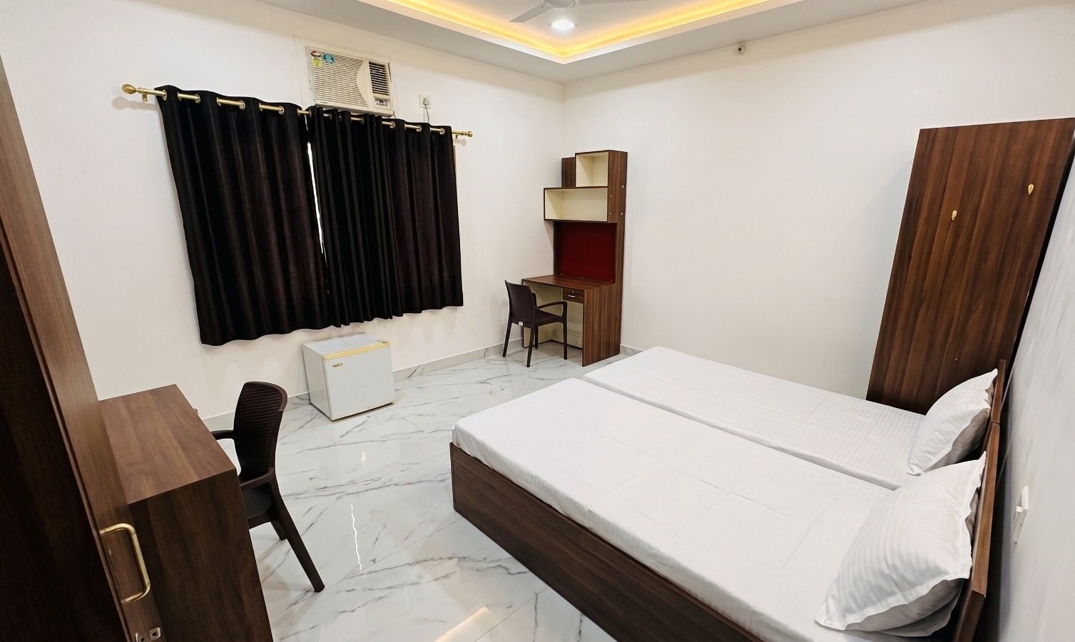 Premium AC room with study desk — Rudrabhishek Homes boys hostel Kota